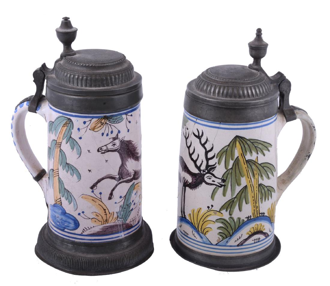 A German fayence polychrome tankard and hinged pewter (1 of 2)