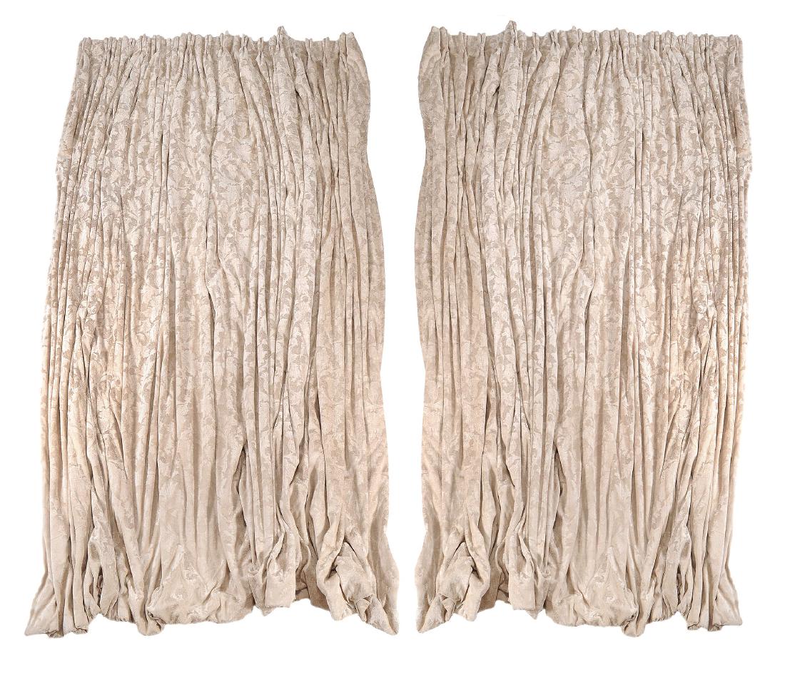 A pair of interlined chenille cream/beige curtains with: A pair of interlined chenille cream/beige curtains with thistle design , 255cm wide, 320cm drop