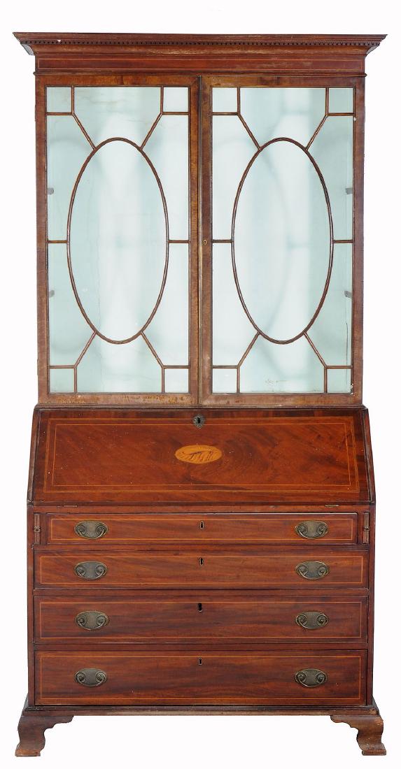 A George III mahogany and glazed bookcase and (1 of 3)