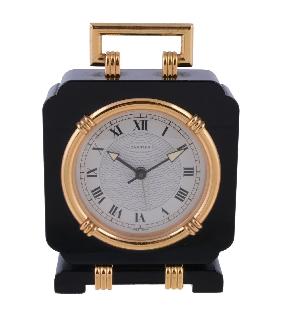Cartier, a gilt metal and black lacquered alarm clock, (1 of 1)