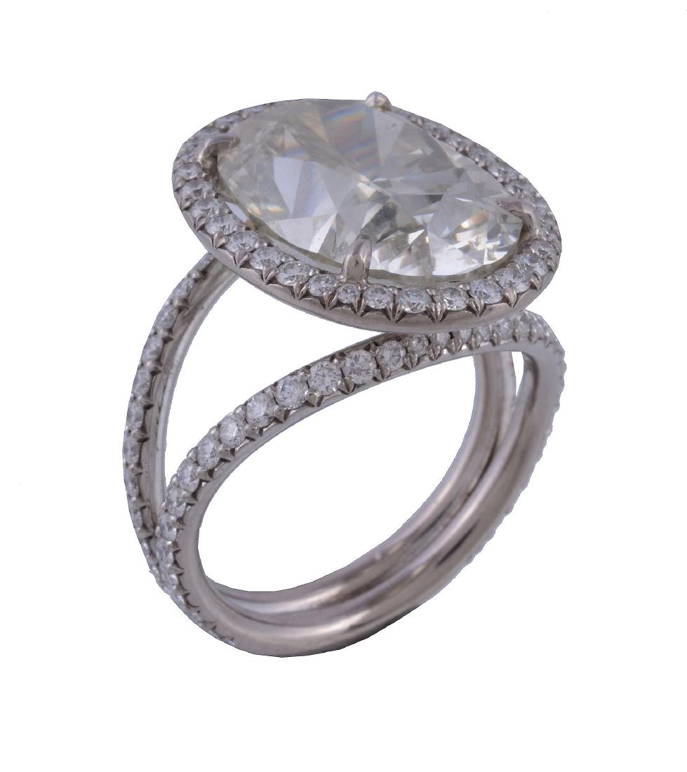 A diamond cluster ring, the central oval cut diamond, (1 of 1)