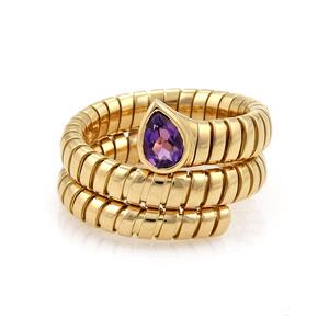 Bvlgari Bulgari Tubogas 1.00ct Amethyst 18k Gold Wrap: This authentic Bvlgari piece is finely crafted from 18k yellow gold. It comes from Bvlgari's Tubogas collection and features the classic Tubogas wrapped design along with a stunning high polished fini