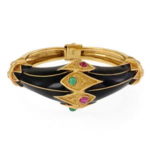 Estate Diamond Ruby Emerald Enamel 18k Yellow Gold Dome Bracelet: This gorgeous Estate bracelet is crafted from 18k yellow gold, it is hinged on one side with slide clasp fit in and snap shut clasp. The front half is wide with a dome shape set with black enamel and