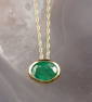 EMERALD AND FOURTEEN KARAT GOLD PENDANT NECKLACE