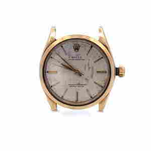 Vintage Rolex Manual Wind 14k Yellow Gold Men's Watch 1002: This vintage authentic handwind chronometer men's wristwatch by Rolex . The case is crafted from 14k yellow gold without band. The face is gold with polished gold stick hourmarkers and hands. It is ha
