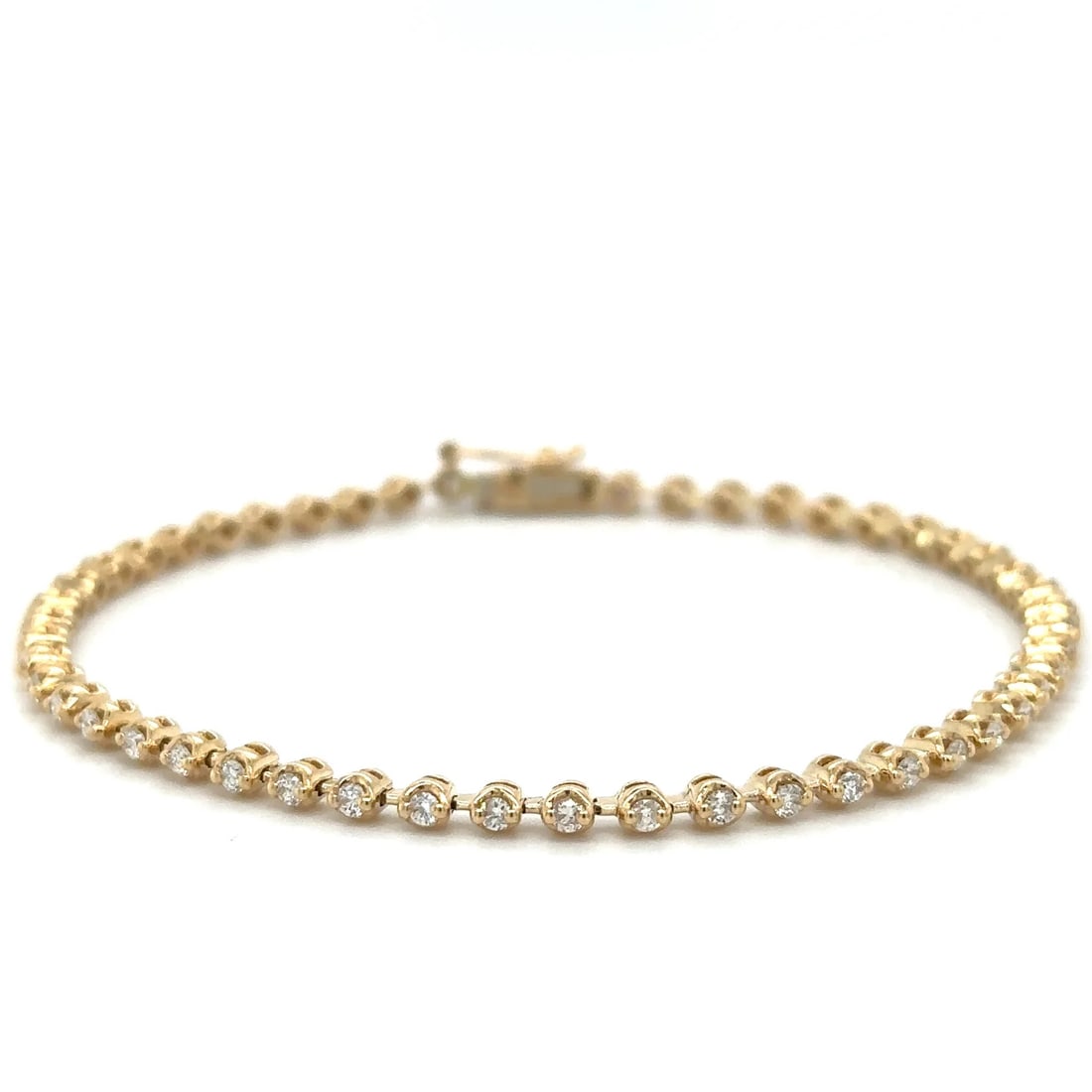 DIAMOND TENNIS BRACELET: 14KT YELLOW GOLD DIAMOND TENNIS BRACELET 7"14KT GOLD WT. APPROX. 6.54 GRAMDIAMOND WT. APPROX. 1.09 CT / 51 PCS