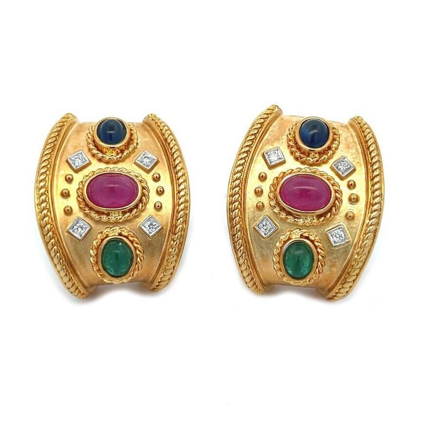 Diamond & Gems 18k Yellow Gold Tapered Wide Bar Huggie Earrings: This gorgeous pair of earrings are crafted from 18k yellow gold featuring a 22mm wide tapered long bar with fine twisted cable style on the long end. The center has a smooth satin finish decorated wit