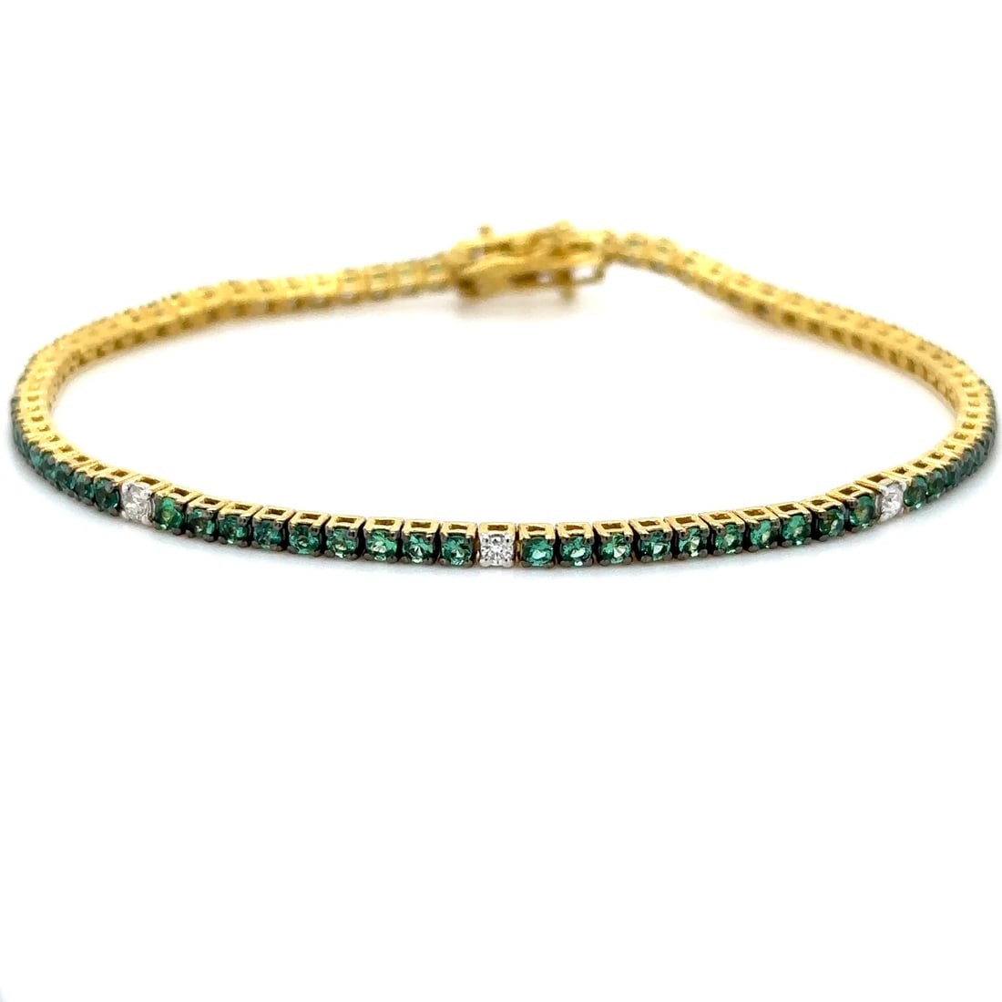 18K YELLOW GOLD EMERALD AND DIAMOND TENNIS BRACELET (1 of 4)