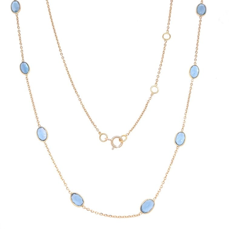 18KT GOLD BEZELED LONDON BLUE TOPAZ OVAL STATION NECKLACE: 18KT GOLD BEZELED LONDON BLUE TOPAZ OVAL STATION NECKLACE18" LONG CHAIN WITH ADJUSTABLE RING ON 16" & 17" EXTENDER18KT GOLDWT. APPROX. 2.01GRAMSTONE: LONDON BLUE TOPAZSTONE WT. APPROX. 5.00CARAT