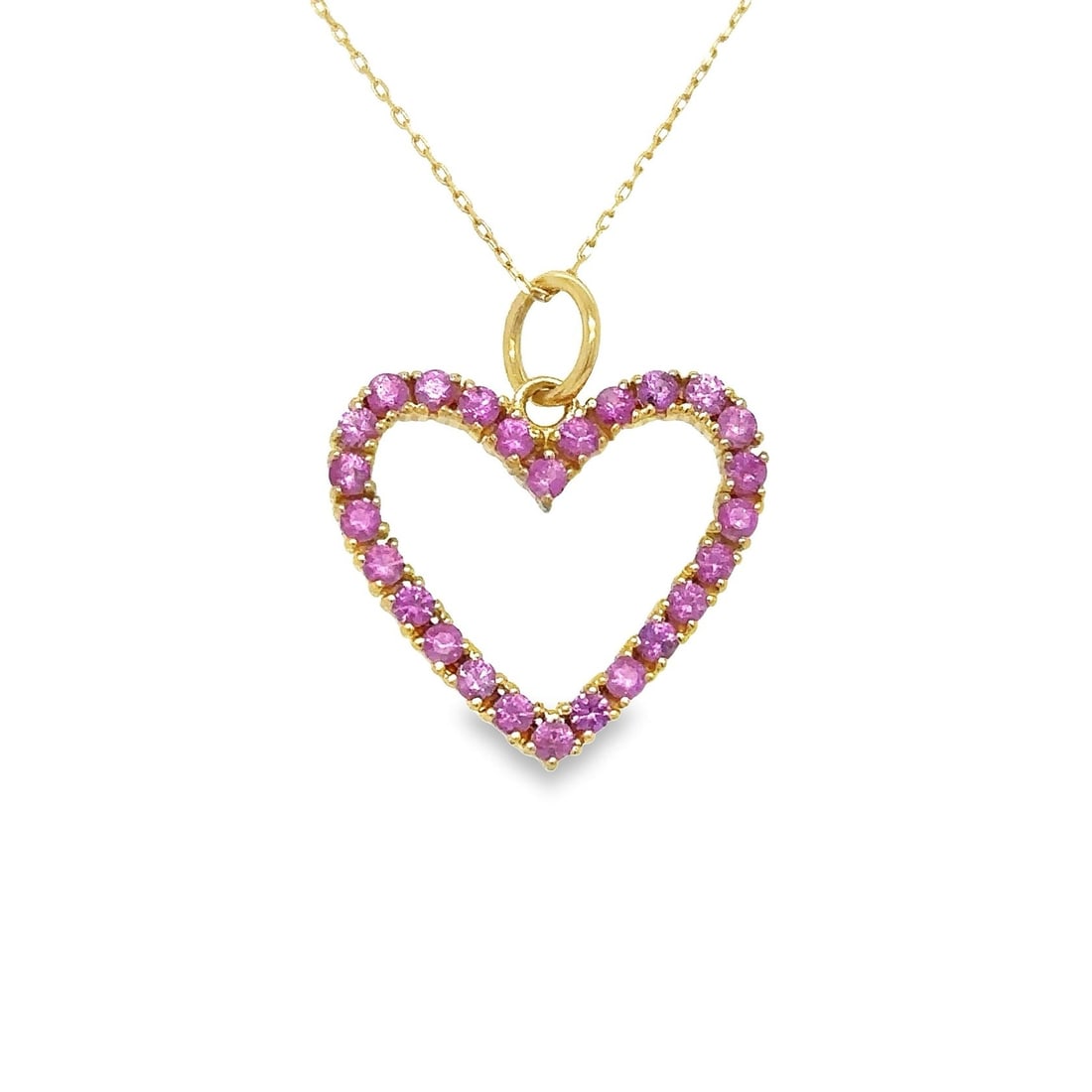 14KT YELLOW GOLD PINK SAPPHIRE HEART PENDANT: 14KT YELLOW GOLD PINK SAPPHIRE HEART PENDANT14KT. GOLD WT. APPROX. 1.60 GRAMP. SAPPHIRE WT. APPROX. 0.80 CT / 26 PCSPRICE IS ONLY FOR PENDANT WITHOUT CHAIN