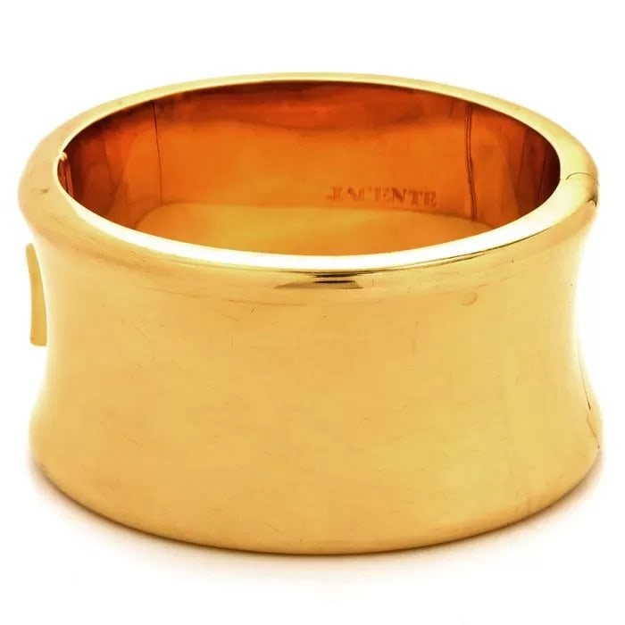 Italian 18K Yellow Gold Concave Mirror Finish Wide Bangle Bracelet: Exquisite Italian Jacente Wide Cuff Bracelets.This Chic 1980s piece is made of 18K yellow gold with a highly polished finish, finely made in Italy.This bracelet weighs approx. 94.1 grams of luxurious