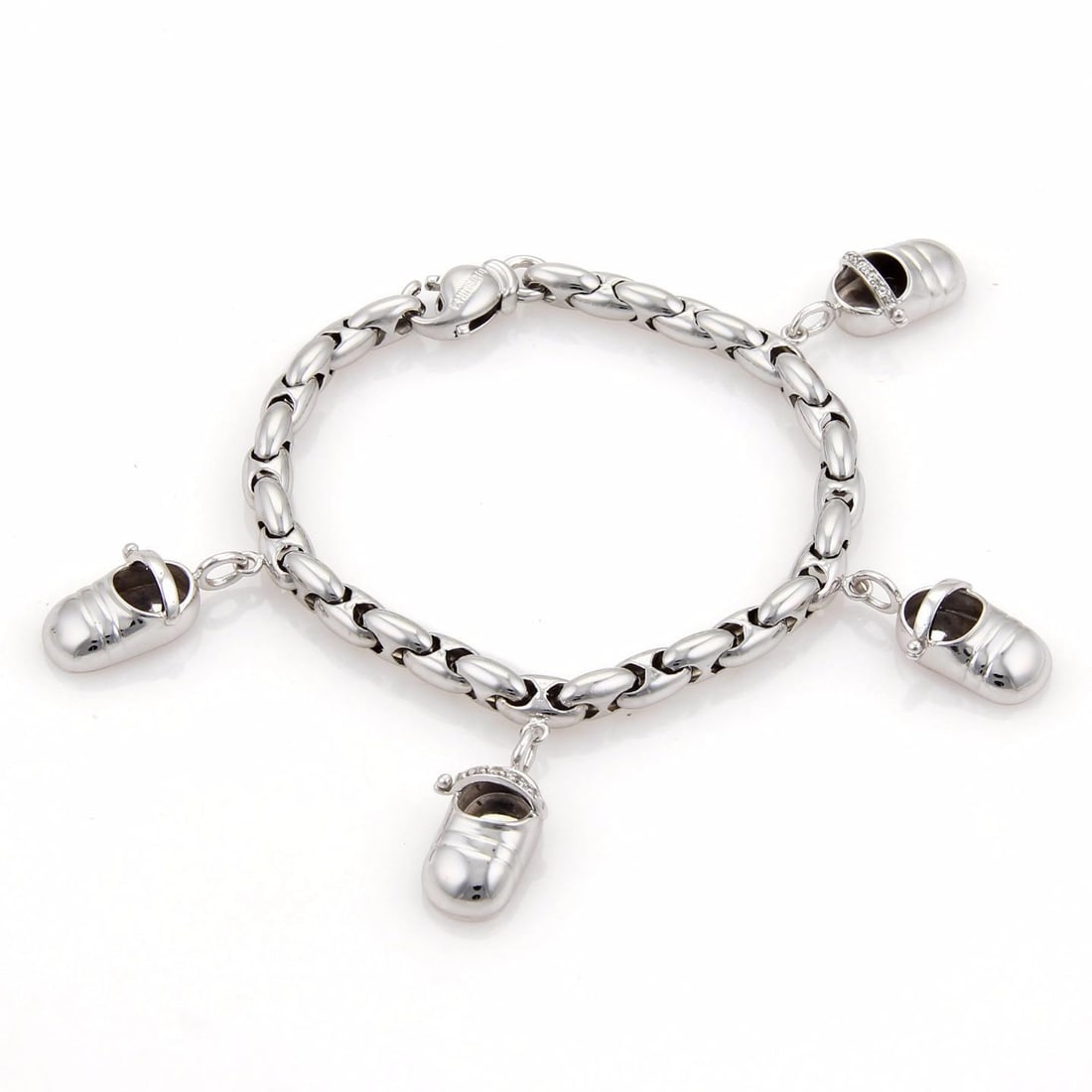 Chimento Charm Bracelet 18k White Gold Diamond 14k White Gold 4 Shoe Charms: This is an authentic charm bracelet from Chimento, it is crafted from solid 18k white gold in a high polished finish and features fancy paddy chain links, there are 4 charms dangling from the bracelet