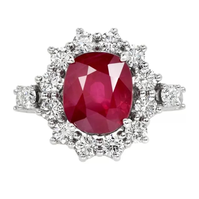 Burmese Cushion Ruby 9.05 carat Diamonds 18K Gold Halo Engagement Ring: Introducing our exquisite Burmese Antique Cushion Ruby Halo Engagement Ring, featuring a stunning 7.132-carat natural Burmese ruby from the famed Myanmar region.This magnificent ruby, weighing 7.132 c