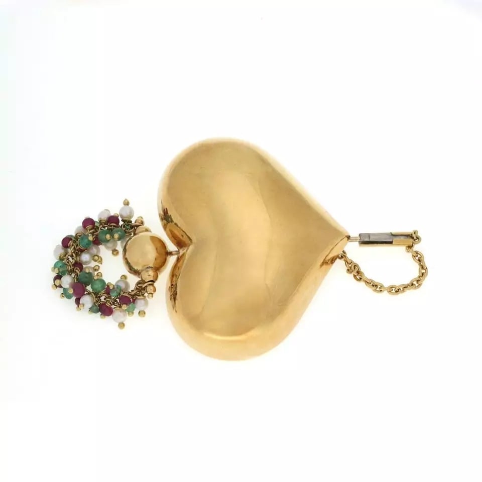 18k Ruby Emerald Brooch Pearls Yellow Gold Heart Pin: This is a lovely vintage heart brooch, it is crafted from 18k yellow gold featuring a large puffed smooth polished heart, a long stick pin is strung through a tiny link at the back of the heart and a
