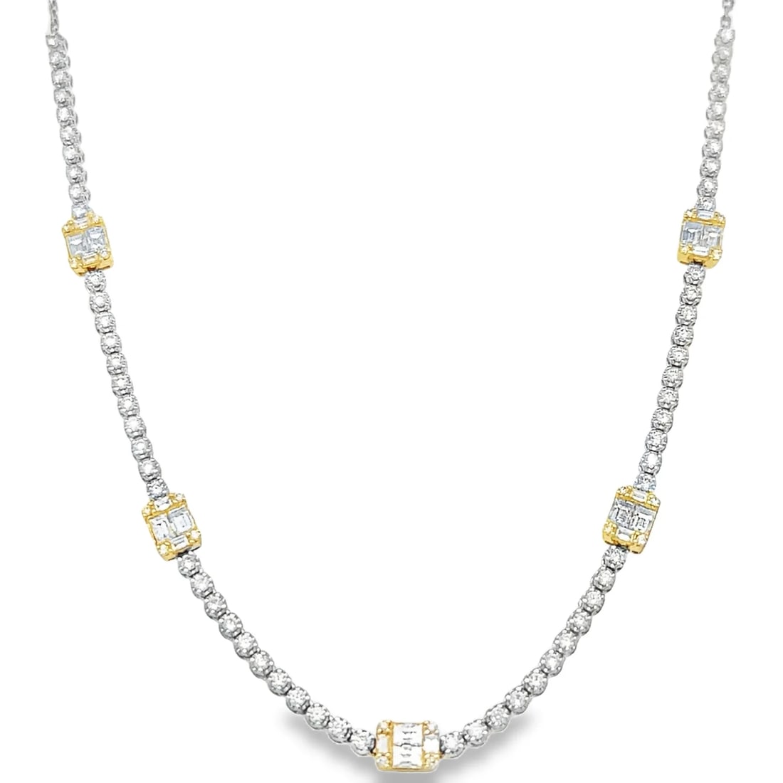 18KT WHITE GOLD DIAMOND TENNIS NECKLACE: 18KT WHITE GOLD DIAMOND TENNIS NECKLACE 16" ADJUSTABLE18KT GOLD WT. APPROX. 7.65 GRAMBAGUETTE DIAMOND WT. APPROX. 1.10 CARAT / 20 PCSDIAMOND WT. APPROX. 1.32 CARAT / 84 PCS16 INCH ADJUSTABLE LENGTH