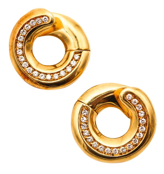 ANTONINI GIOIELLI Hoops Earrings In 18Kt Yellow Gold With 38 VS Diamonds: Hoops earrings designed by Antonini Gioielli. Beautiful and modern pair of hoops earrings, created in Milano Italy by the jewelry house of Antonini. The elegant earrings have been crafted as a left an