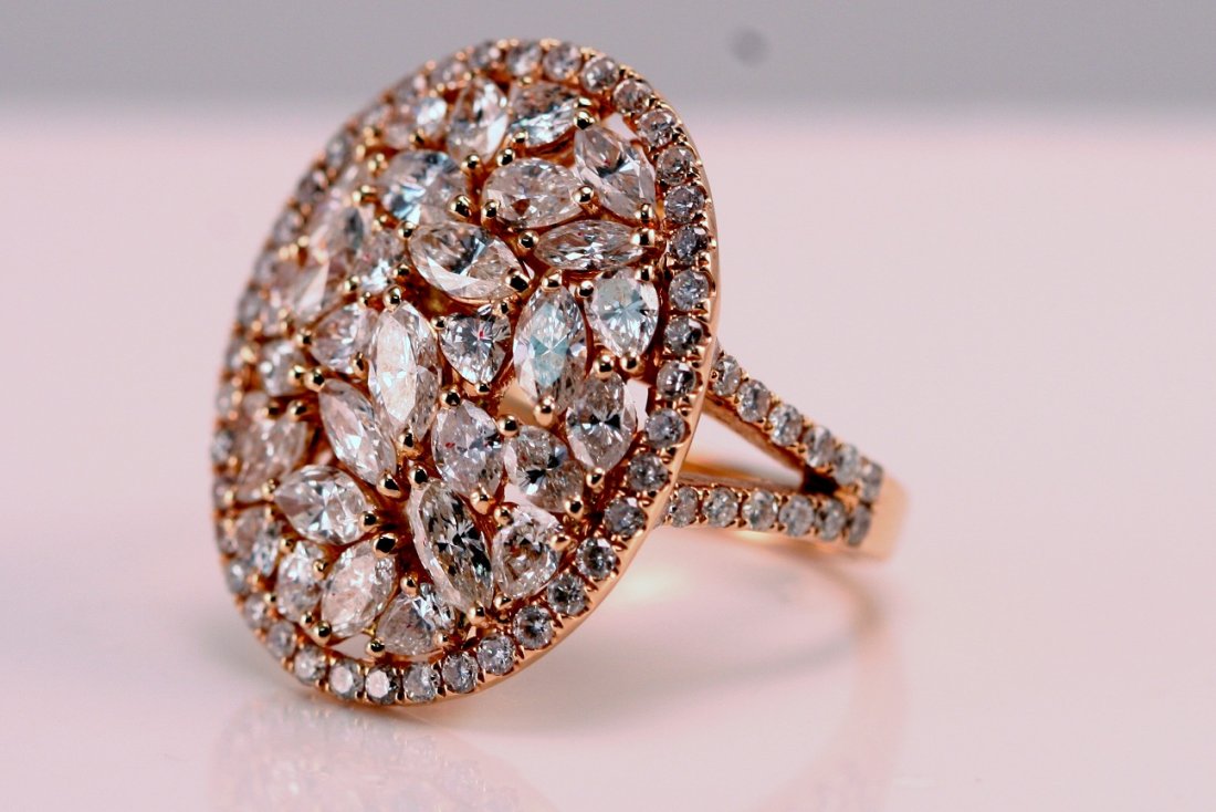 AIG Appraised $8200.00 Ladies Rose Gold Diamond Ri: One Ladies diamond ring set in 18k Rose Gold , weighting 8.50 grams. This ring has a total diamond weight of 3.86 carats, made up of round and various mixed up diamodns. Diamond Color: H-J , Diamond C