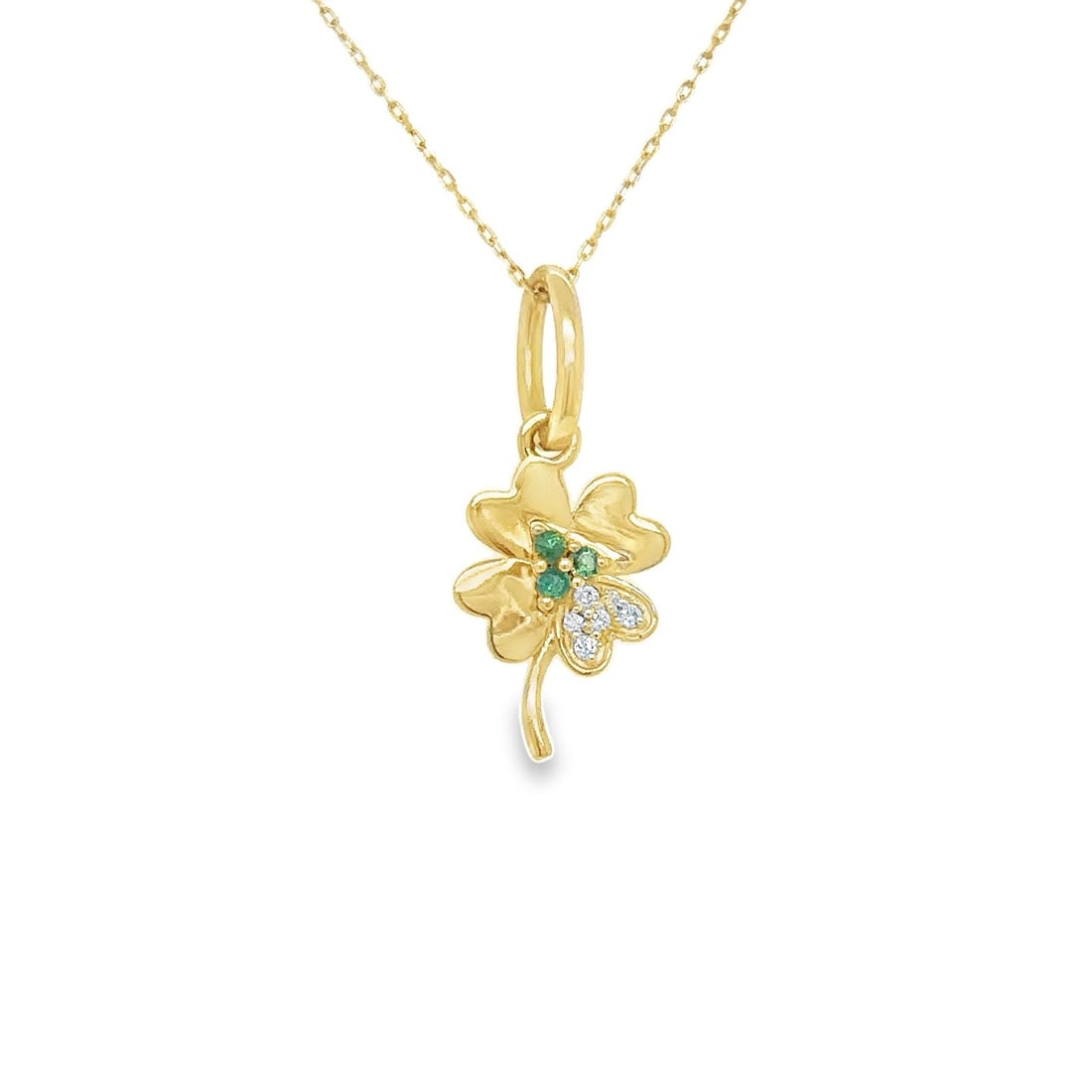 14KT YELLOW GOLD EMERALD AND DIAMOND CLOVER PENDANT: 14KT YELLOW GOLD EMERALD AND DIAMOND CLOVER PENDANT14K GOLD WT. APPOX. 0.96 GMDIAMOND WT. APPOX. 0.03 CARAT / 6 PCSEMERALD WT. APPOX. 0.04 CARAT / 3 PCSSIZE: APPOX 9 X 16 MM (WITHOUT LOOP)PRICE IS ONL