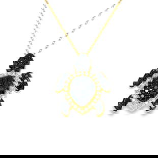14KT YELLOW GOLD BLACK DIAMOND TURTLE NECKLACE: 14KT YELLOW GOLD BLACK AND WHITE DIAMOND TURTLE NECKLACE 18"14KT GOLD WT. APPROX. 3.63 GRAMDIAMOND WT APPROX. 0.15 CARAT / 26 PCSBLACKDIAMOND WT. APPROX. 0.60 CARAT18" LONG CHAIN WITH ADJUSTABLE RING