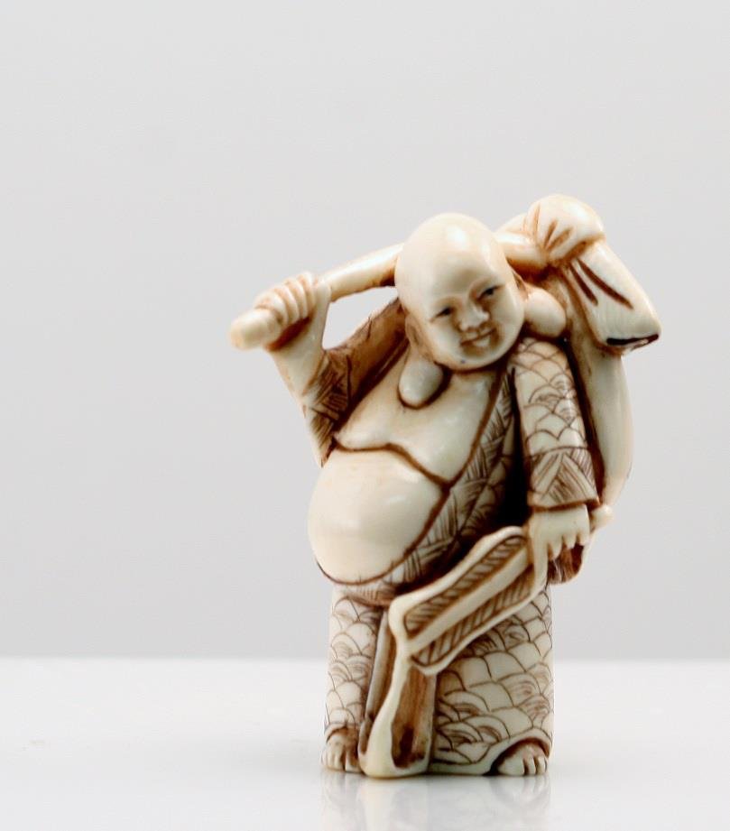 Old Ivory Carved Netsuke of Buddha with Money Bag: One (1) Old Ivory Carved Netsuke of Buddha with Money Bag.