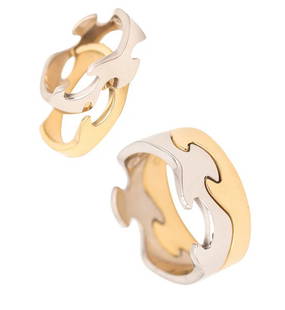 GEORG JENSEN 1970 Denmark By Nina Koppel Fusion Puzzle Duo Rings In 18Kt  Gold: A set of puzzle rings designed by Nina Koppel (1940-1990) for Georg Jensen.This is a very nice set of modernist stackable puzzle rings created in Denmark by Georg Jensen. These fusions rings were desi
