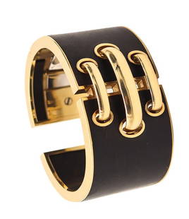 DAVID WEBB Modernist Carved Wood Geometric Cuff-Bangle In 18Kt Yellow Gold: Modernist cuff-bracelet designed by David Webb (1925-1975).This is a magnificent vintage bangle-cuff bracelet created in New York City by the famous jewelry designer David Webb, back in the 1990. The