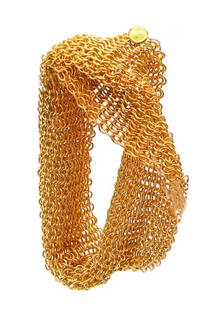 TIFFANY & CO. 1982 Elsa Peretti Mesh Bracelet in 18Kt Gold Vermeil Over Sterling: Mesh bracelet designed by Elsa Peretti (1940-2019) for Tiffany & Co.This flexible mesh bracelet, is one of the iconic Elsa Peretti's designs, that she created for the Tiffany Studios, back in the 1980
