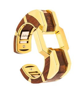 DAVID WEBB Cubism Carved Wood Geometric Cuff-Bangle In 18Kt Yellow Gold: Modernist cuff-bracelet designed by David Webb (1925-1975).This is an outstanding vintage bangle-cuff bracelet created in New York City by the famous jewelry designer David Webb. The extraordinary bra