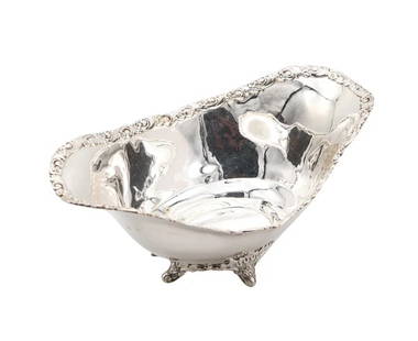 TIFFANY & CO. 1901 Charles T. Cook Four-Legged Nut Dish In .925 Sterling  Silver: A four-legged dish designed by Tiffany & Co.This is a beautiful antique Edwardian four-legged open dish for nuts, created in 1901 at Tiffany & Co. in New York city. It was carefully crafted in solid s