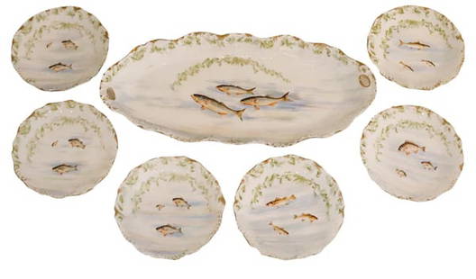 LIMOGES France 1910 Elite Set of White Porcelain Dishes And Tray For Fish Serving: Set of fish serving dishes designed by Limoge France.This is a beautiful set of dishes for fish serving created in Limoges France, around the 1890 and 1910. The art nouveau set is composed by six dish