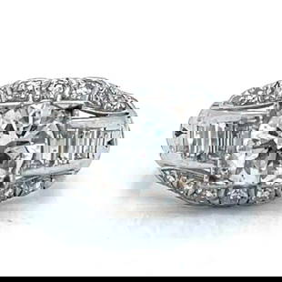 Art Deco Platinum 1.95 Ct. Diamond Ring: Art Deco Platinum 1.95 Ct. Diamond RingWeighing 5.4 gramsSet with an app. 1.35 Ct. DiamondH Color, SI1 ClarityAlong with 20 Diamonds weighing app. 0.65 Ct.F-G Color, VS1-SI1 ClarityRing Size 7