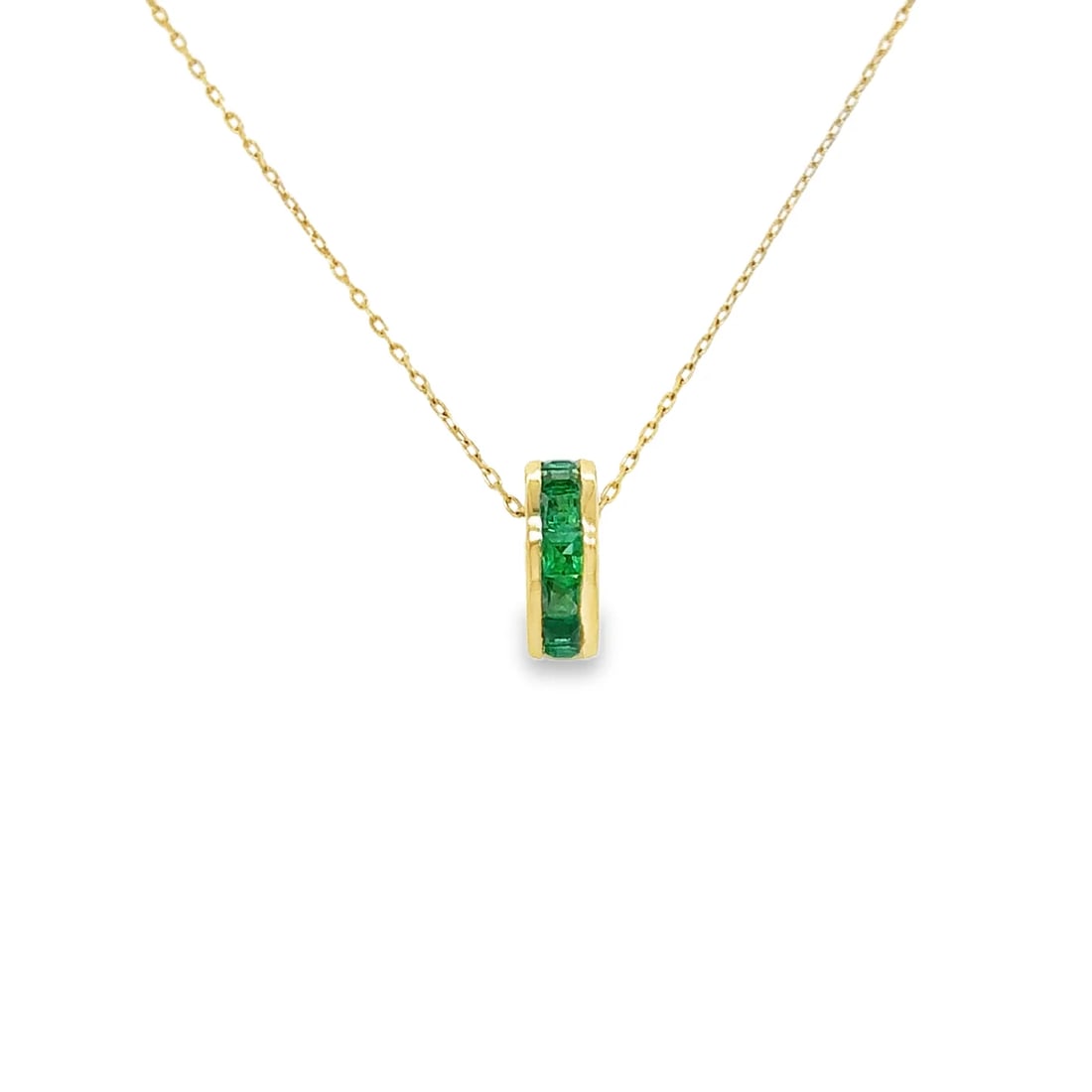 14KT YELLOW GOLD EMERALD ROUND PENDANT: 14KT YELLOW GOLD PRINCESS CUT EMERALD ROUND PENDANT14KT GOLD WT. APPROX. 0.62 GRAMEMERALD WT. APPROX. 0.37 CTSIZE APPOX. - 8 MMPRICE IS ONLY FOR PENDANT WITHOUT CHAIN