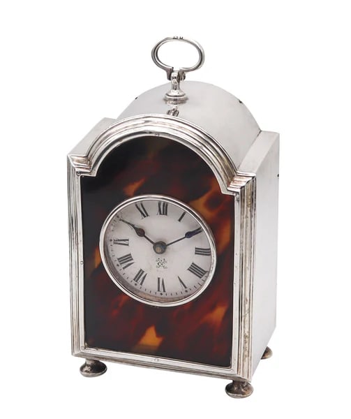 CHARLES & RICHARD COMYNS London 1919 Table Clock In .925 Sterling Shell & Wood: Desk table clock designed by Charles & Richard Comyns.This is a beautiful desk clock created by the top notch and prestigious silversmith company of Charles & Richard Comyns. The case was designed in