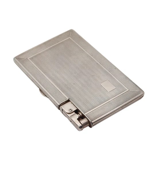 MYLFLAM ENGLAND Dublin 1949 Compendium Lighter Case In .925 Sterling Silver: A compendium lighter cigarette case made in England.This is a very rare compendium cigarettes and lighter case, created in Dublin England during the post-war back in 1947. The entire piece has been cr