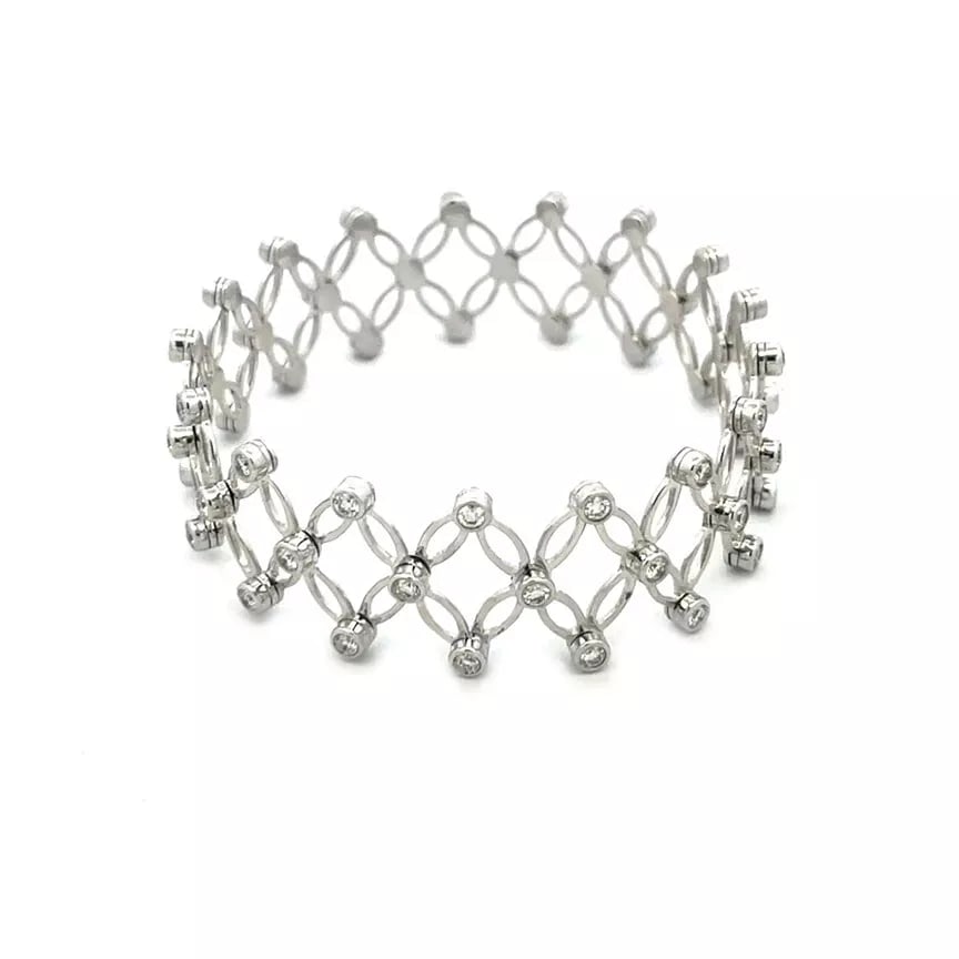 Afarin Gold Convertible Ring Bracelet 18k White Diamond Band: This is a beautiful convertible bracelet to ring by designer Afarin, it is crafted from 18k white gold featuring a four petals star like floral link with bezel set diamonds on each end of the star and
