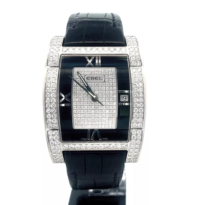 1Ebel Tarawa Gold Watch 18k White Diamond Face Bezel Leather Band: This eye-catching wristwatch is by EBEL, in the luxury style model Tarawa. It features an 18k white gold case with a diamond-accented bezel and a black dial with Roman numerals, a rectangle center fac