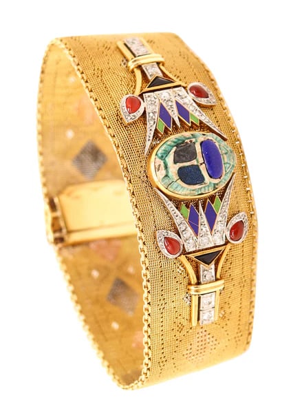 EGYPTIAN REVIVAL 1920 Italian Art Deco Mesh Bracelet In 18Kt Gold With Gemstones: An Egyptian revival ring.This is a magnificent antique mesh bracelet created in Italy in the Egyptian revival style, back in the 1920. The outstanding art-deco bracelet has been meticulously crafted w