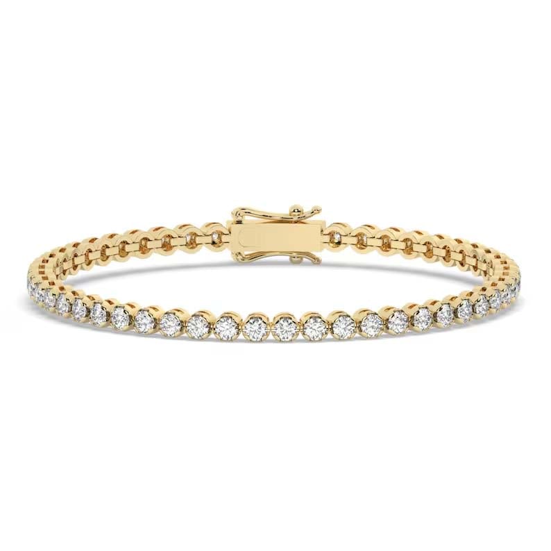 14KT YELLOW GOLD CHAMPAGNE DIAMOND BUTTERCUP TENNIS BRACELET: 14KT YELLOW GOLD DIMAOND TENNIS BRACELET14KT GOLD WT. APPROX. 7.82 GRAMDIAMOND WT. APPROX. 2.10 CARAT/ 54 PCSLENGTH: 7 INCHES LONG