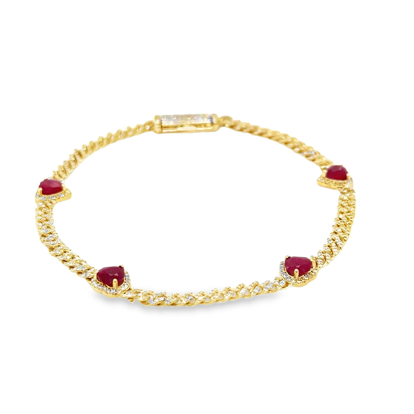 14KT YELLOW GOLD RUBY AND DIAMONDS HEART CUBAN BRACELET: 14KT YELLOW GOLD PINK RUBY AND DIAMONDS HEART CUBAN BRACELET 7"14KT GOLD WT. APPROX. 5.14 GRAMDIAMOND WT. APPROX. 0.76 CARAT / 552 PCSRUBY WT. APPROX. 1.73 CARAT / 4 PCS