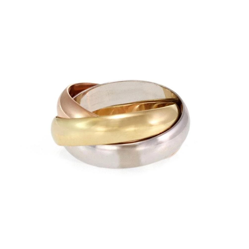 Cartier Trinity 18k Tricolor Gold 5mm Rolling Band Ring Size 50-US 5.25: This is an authentic band ring by Cartier from the Trinity collection. It is crafted from 18k pink, white and yellow gold in a fine polished finish. Each ring is 2mm wide and the three color bands