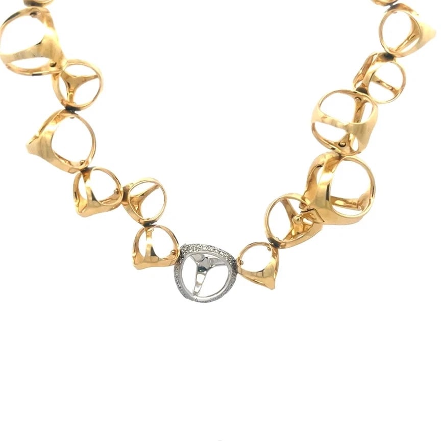 Di Modolo Diamond Gold Triadra Necklace 18k Two Tone Open Style: This chic and fashionable Di Modolo necklace is from the Triadra Collection. It is a gorgeous necklace featuring open ball motifs in polished yellow gold with one ball in white gold decorated with