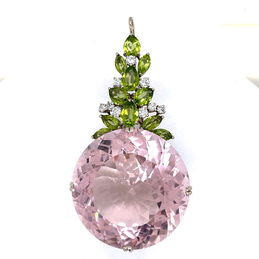 18K White Gold Kunzite, Peridot, and Diamond Pendant: 18K White Gold Kunzite, Peridot, and Diamond PendantWeighing 52.1 gramsSet with an app. 200.00 Ct. KunziteAlong with 11 Peridots weighing app. 15.00 Ct.And 9 Diamonds weighing app. 1.40 Ct.G-H Color,