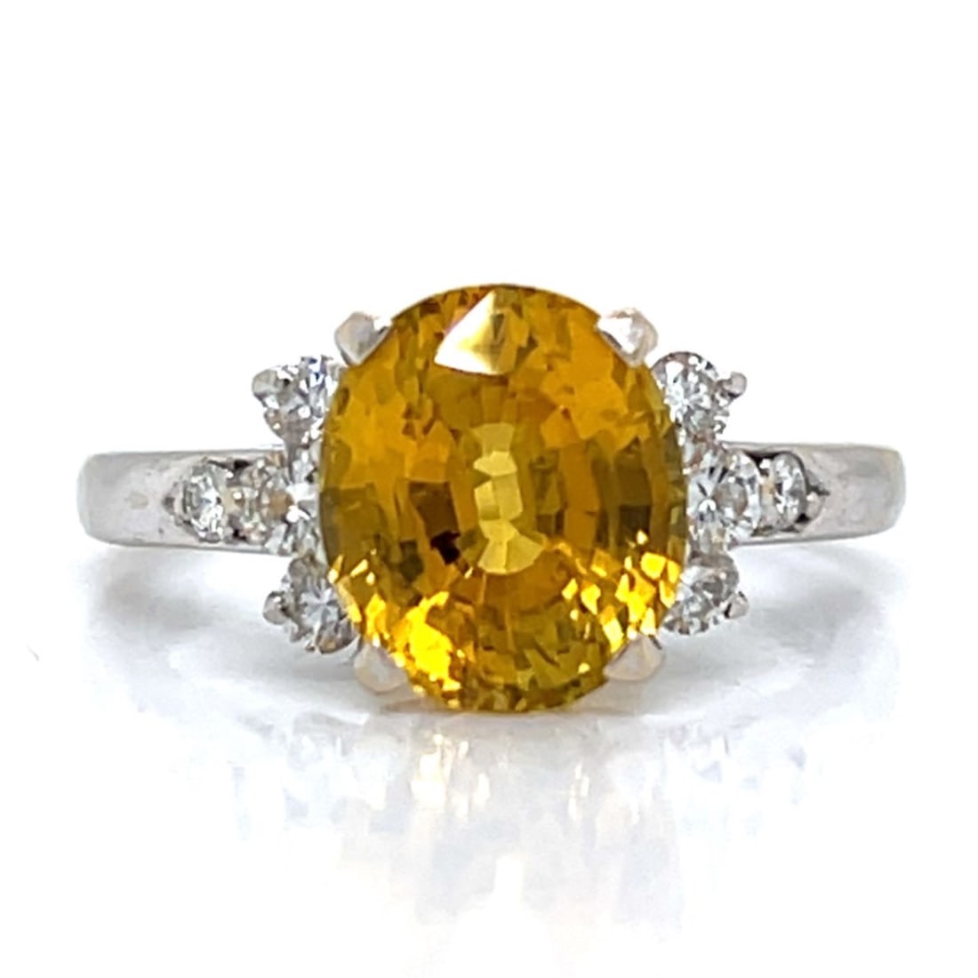 KRISTIN 18K White Gold GIA Certified No-heat Yellow Sapphire & Diamond Ring: KRISTIN 18K White Gold GIA Certified No-heat Yellow Sapphire & Diamond RingWeighing 4.4 gramsSet with an ap. 3.00 Ct. GIA Certified No-heat Yellow SapphireAlong with 10 Diamonds weighing app. 0.40