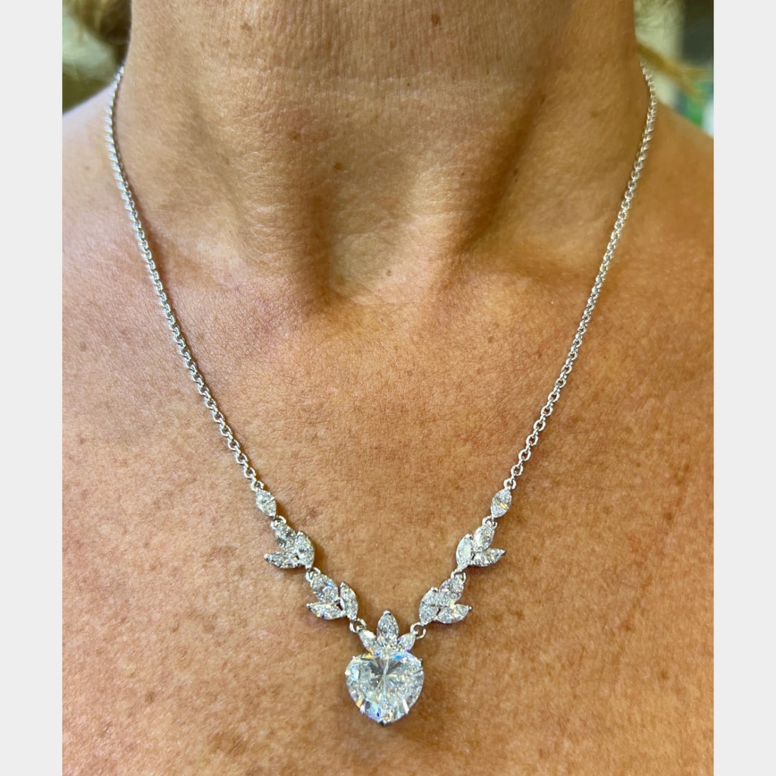 Platinum GIA Certified 4.17 Ct. Diamond Necklace: Platinum GIA Certified 4.17 Ct. Diamond NecklaceWeighing 14.0 gramsSet with a GIA Certified 4.17 Ct. Heart-shape DiamondH Color, SI2 ClarityCOPY OF CERTIFICATE ONLYAlong with 17 Diamonds weighing