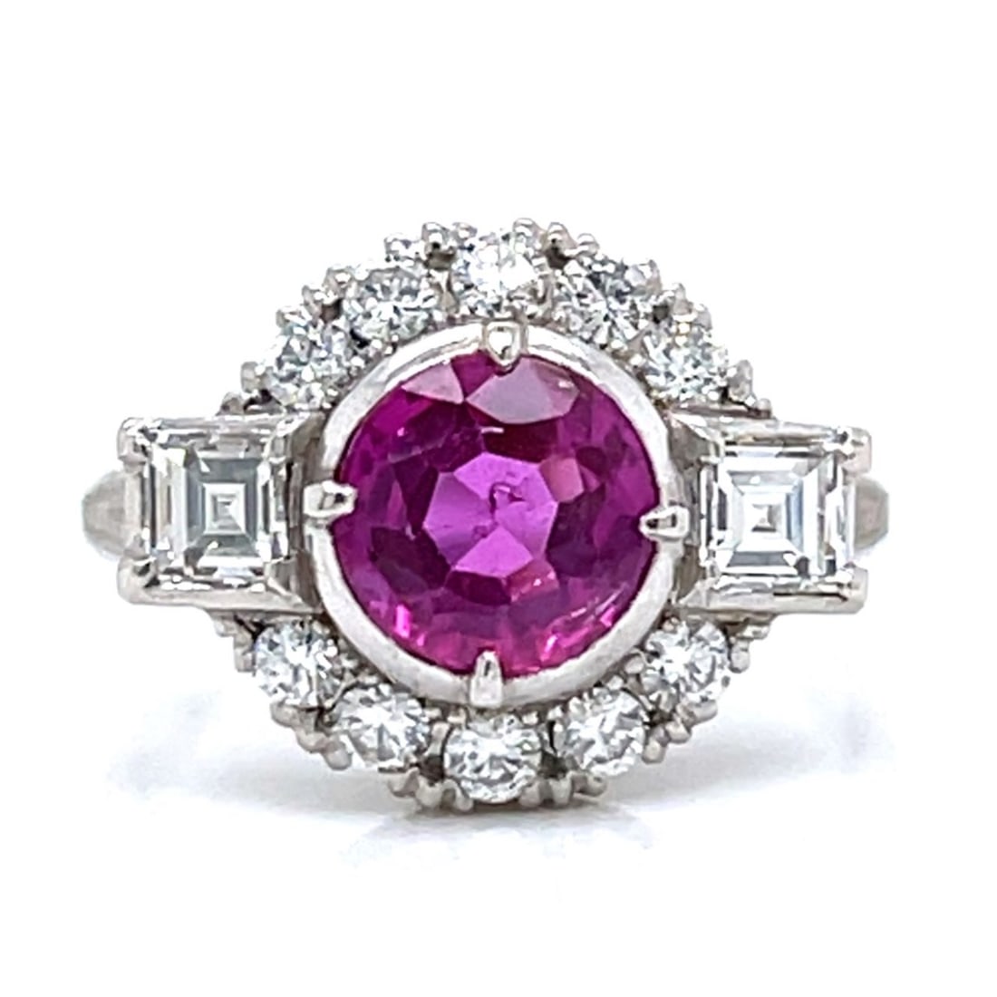 Platinum GIA Certified Burma No-heat Pink Sapphire and Diamond Ring: Platinum GIA Certified Burma No-heat Pink Sapphire and Diamond RingWeighing 5.6 gramsSet with a GIA Certified Burma No-heat Pink Sapphire weighing app. 1.35 Ct.Along with 2 Ascher-cut Diamonds weighin