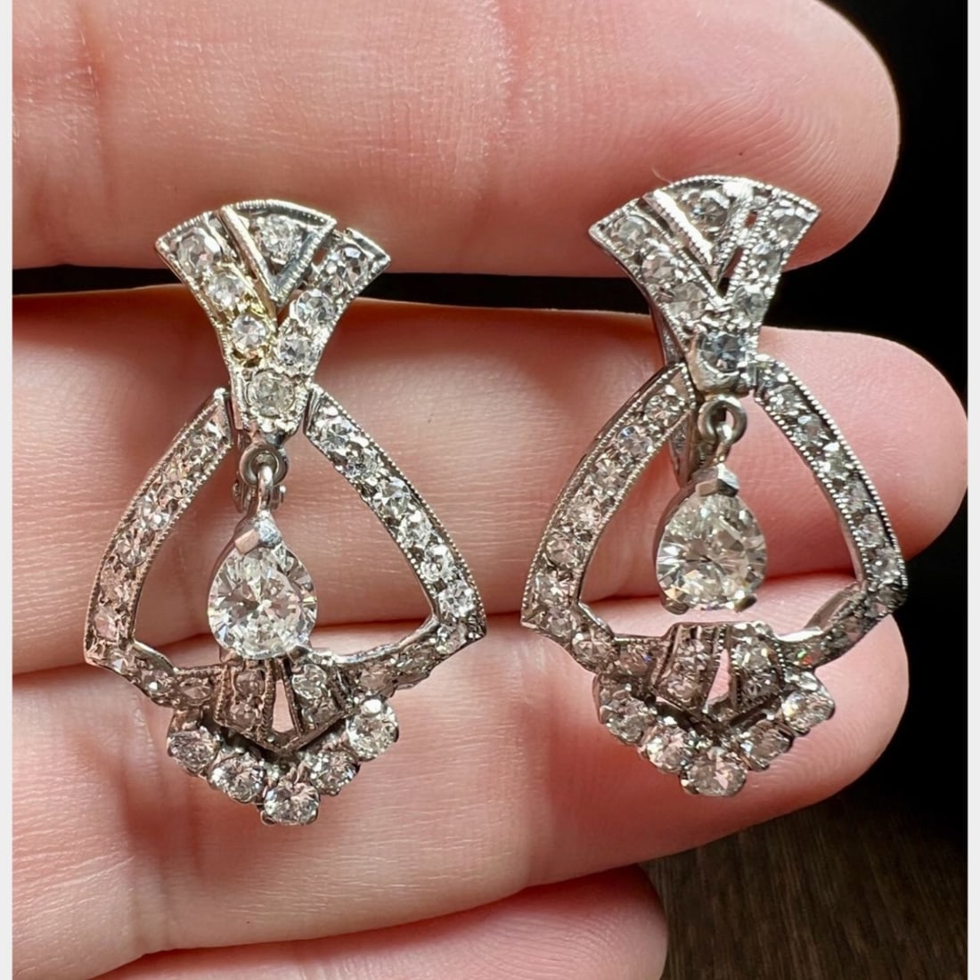 Art Deco Platinum 3.80 Ct. Diamond Earrings: Art Deco Platinum 3.80 Ct. Diamond EarringsWeighing 7.6 gramsSet with 2 Pear-shape Diamonds weighing app. 1.30 Ct.I-J Color, VVS-VS ClarityAlong with 70 Diamonds weighing app. 2.50 Ct.F-H Color,
