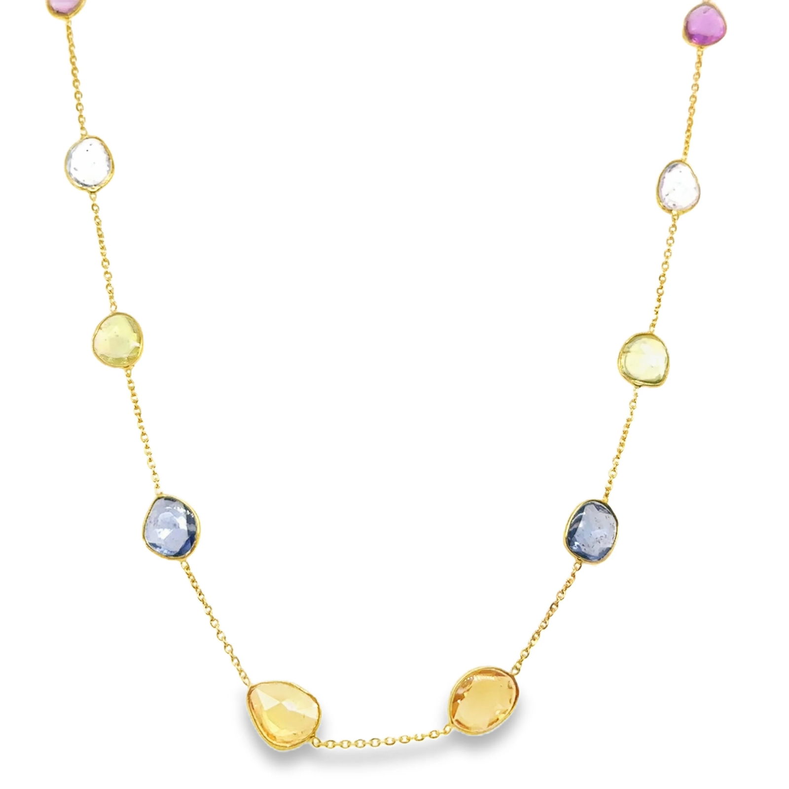 18KT GOLD BAZELED MULTI SAPPHIRE SLICE CUT STATION NECKLACE: 18KT YELLOW GOLD BAZELED MULTI SAPPHIRE SLICE CUT STATION NECKLACE 18"18KT GOLD WT. APPROX. 2.37 GRAMSAPPHIRE WT. APPROX. 9.00 CARAT/ 12 PCS18" LONG WITH ADJUSTABLE RING ON 16" AND 17"
