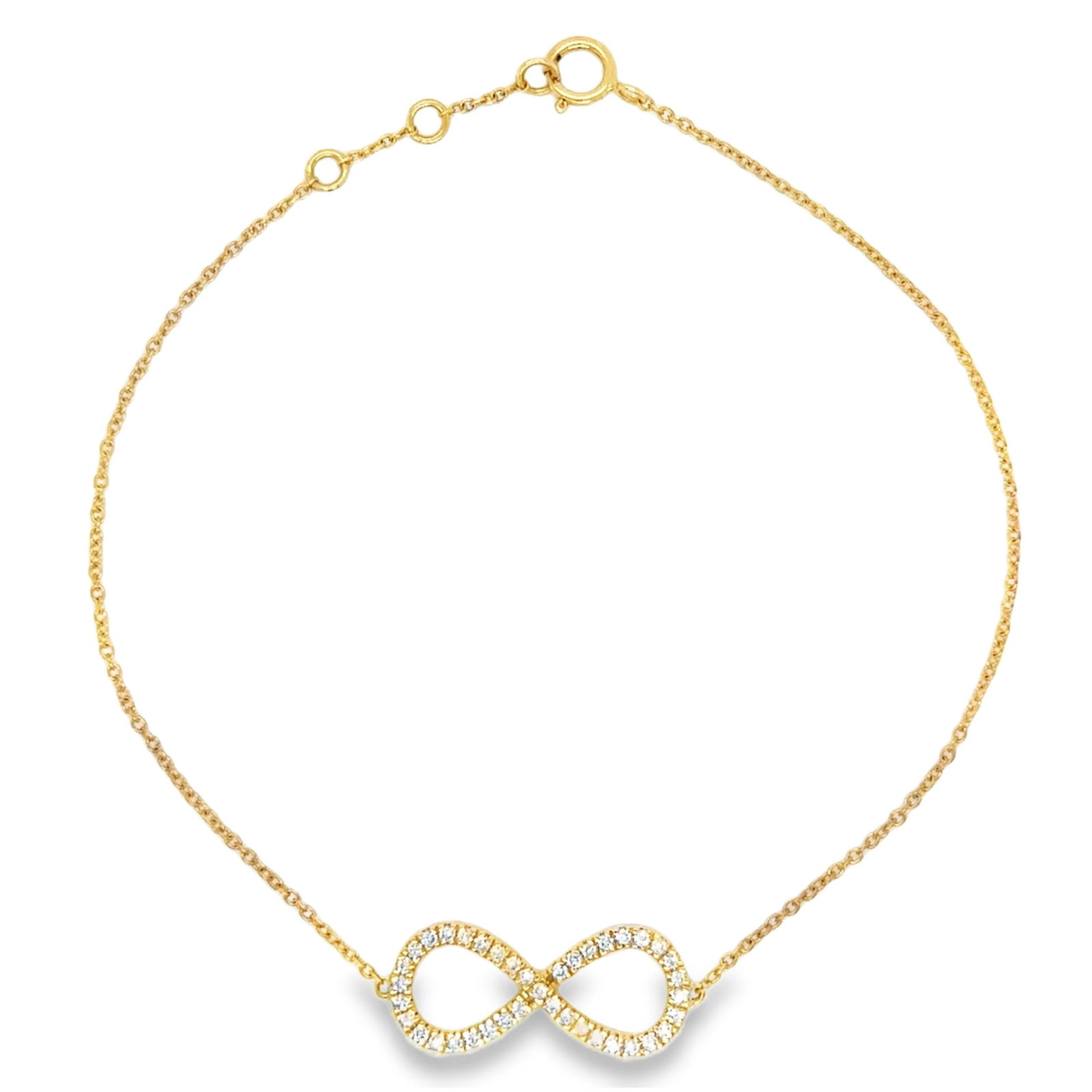 18KT GOLD DIAMOND INFINITY CHAIN BRACELET: 18KT YELLOW GOLD DIAMOND INFINITY CHAIN BRACELET 7.5"18KT GOLD WT. APPROX. 2.09 GRAMDIAMOND WT. APPROX. 0.21 CARAT / 39 PCSINFINITY SIZE APPROX. - 8.5 MM X 20 MM7.5 INCHES LONG WITH ADJUSTABLE RING