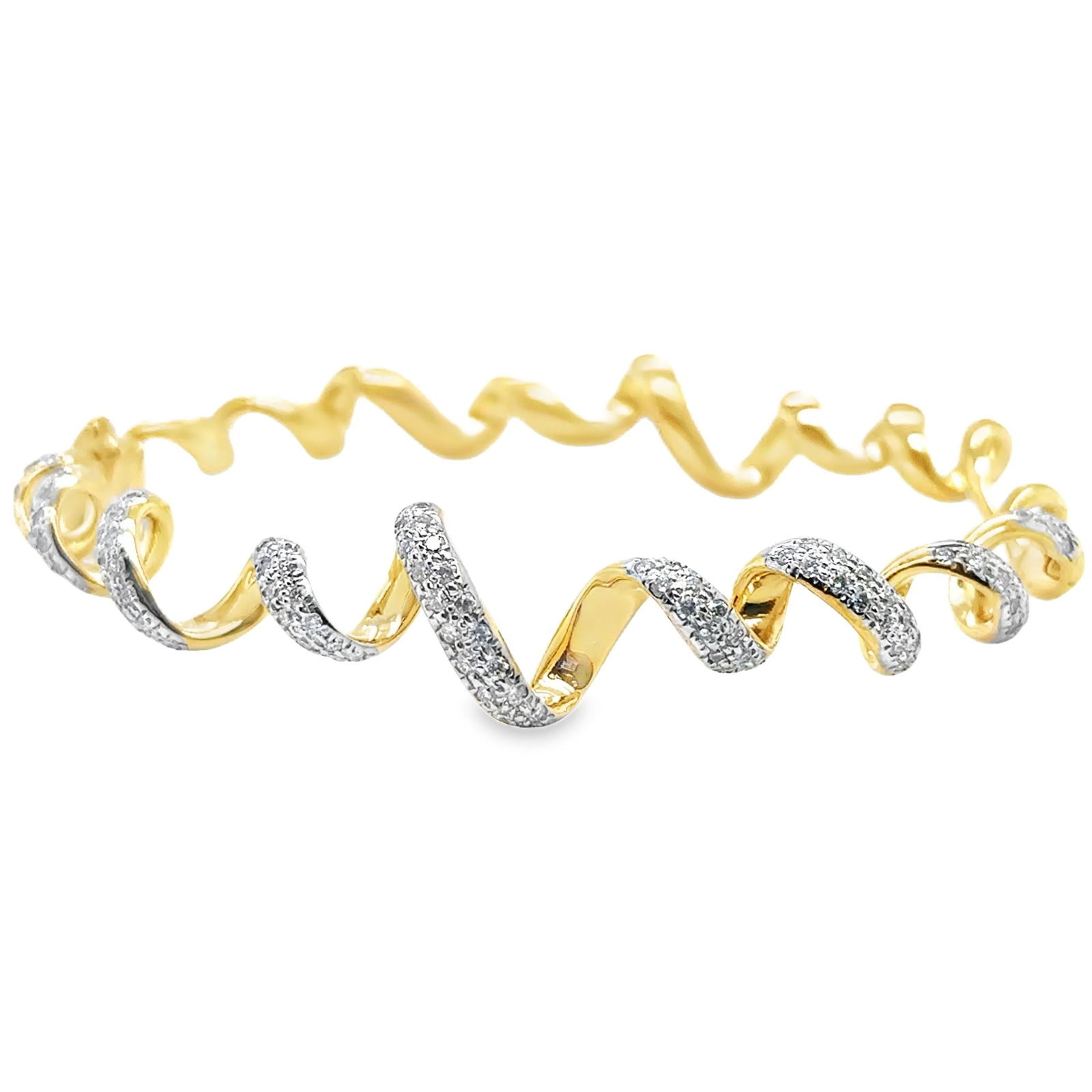 14KT GOLD DIAMONDS BANGLE: 14KT YELLOW GOLD DIAMONDS BANGLE14KT GOLD WT. APPROX. 18.12 GRAMDIAMOND WT. APPROX. 0.99 CTS / 117 PCSSIZE APPROX. 67 X 61 MMWIDTH APPROX. 11 MM