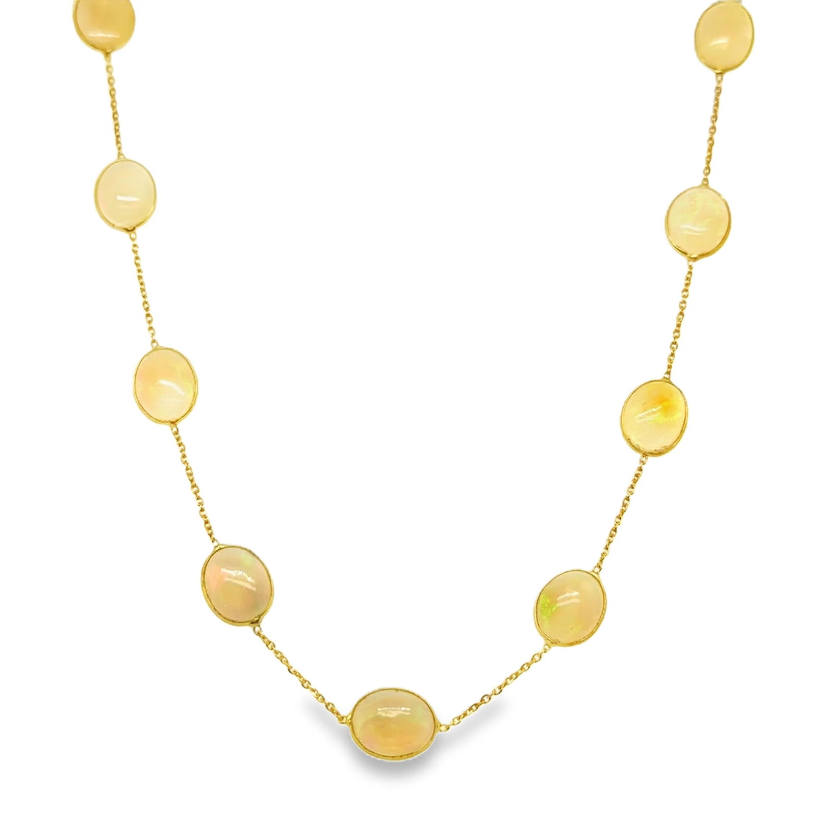 18KT GOLD BAZELED OPAL STATION NECKLACE: 18KT YELLOW GOLD BAZELED OPAL STATION NECKLACE 18"18KT GOLD WT. APPROX. 2.95 GRAMOPAL WT. APPROX. 14.85 CARAT/ 12 PCS18" LONG WITH ADJUSTABLE RING ON 16" AND 17" OPAL SIZE APPROX. - 10.5 MM X 8.5 MM